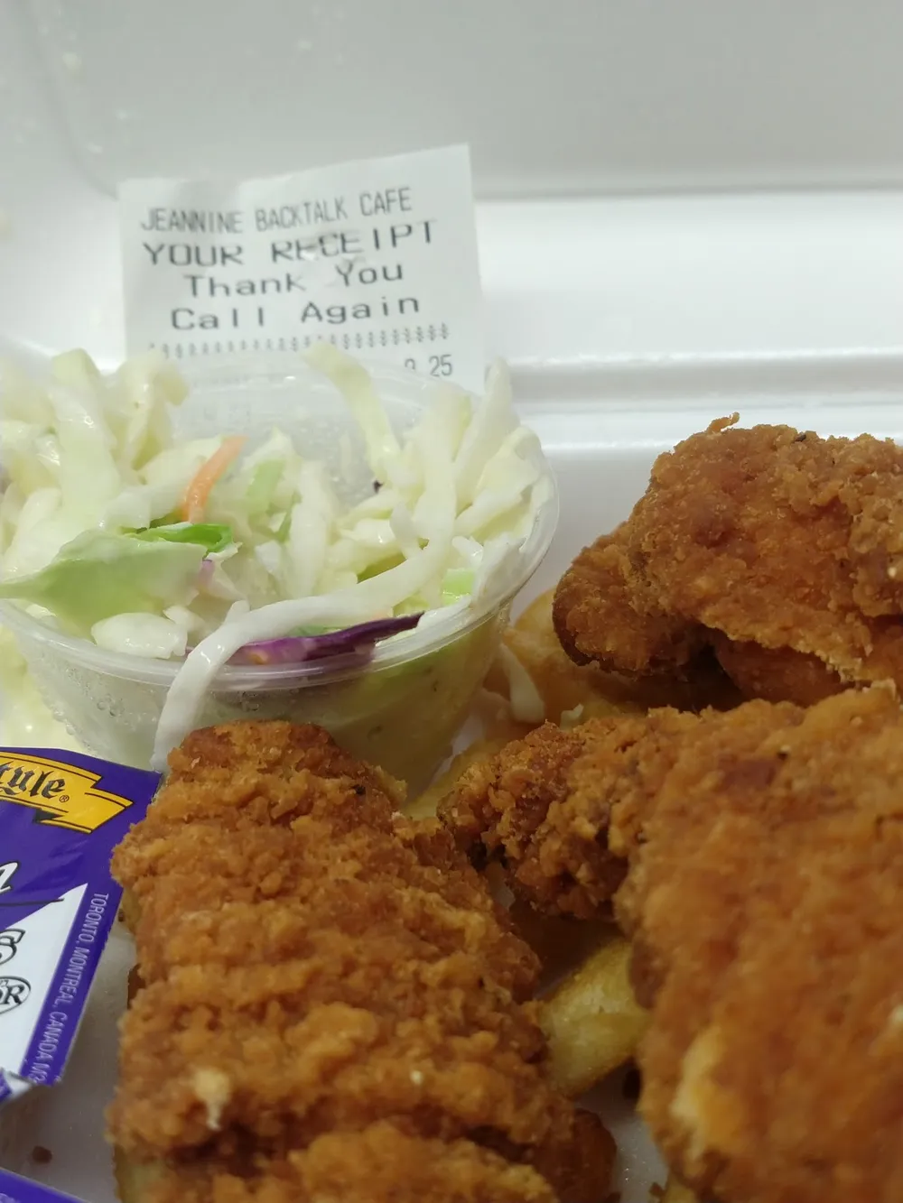 Golden chicken strips with coleslaw